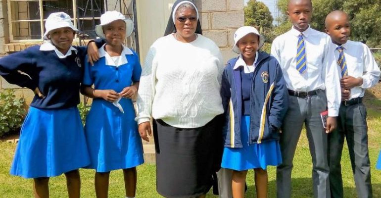 sr-augustina-with-students_web